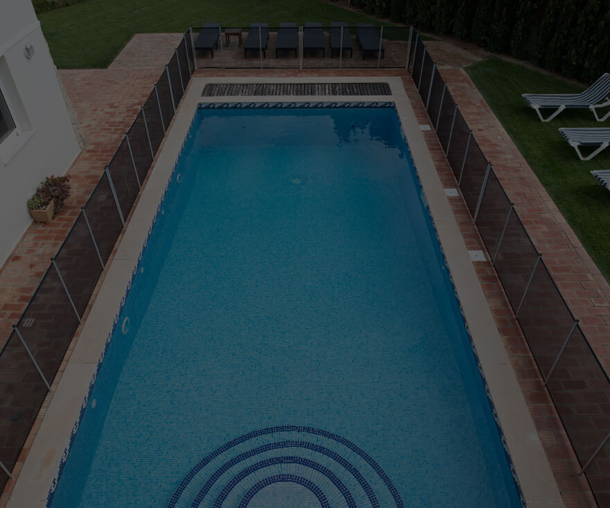 swimming pool with fences around it